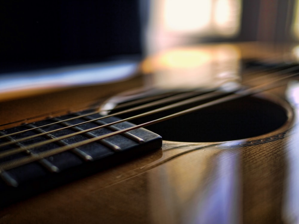 brown acoustic guitar