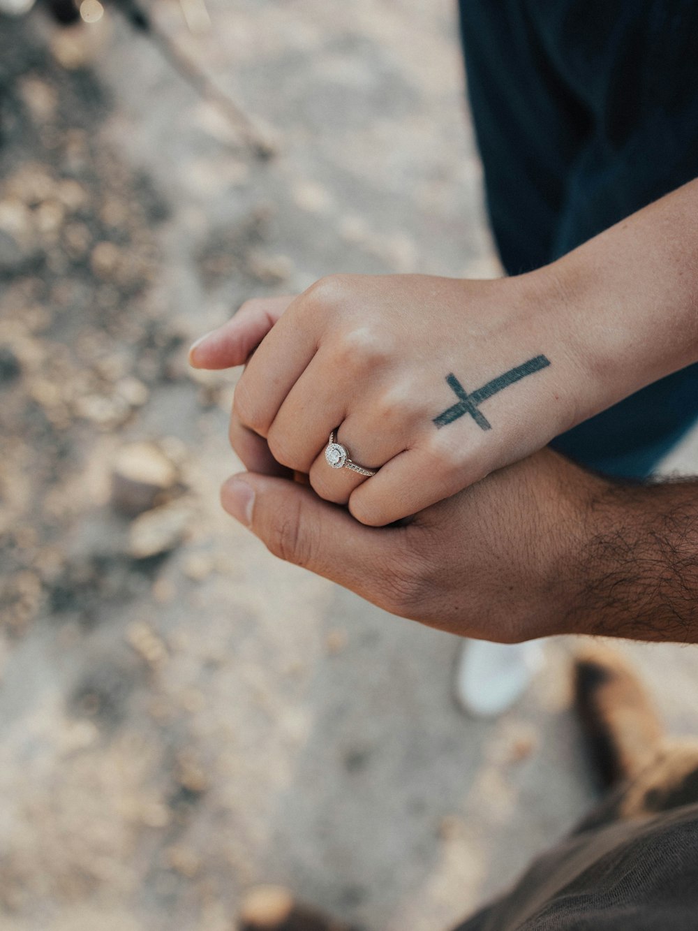 two people holding hands