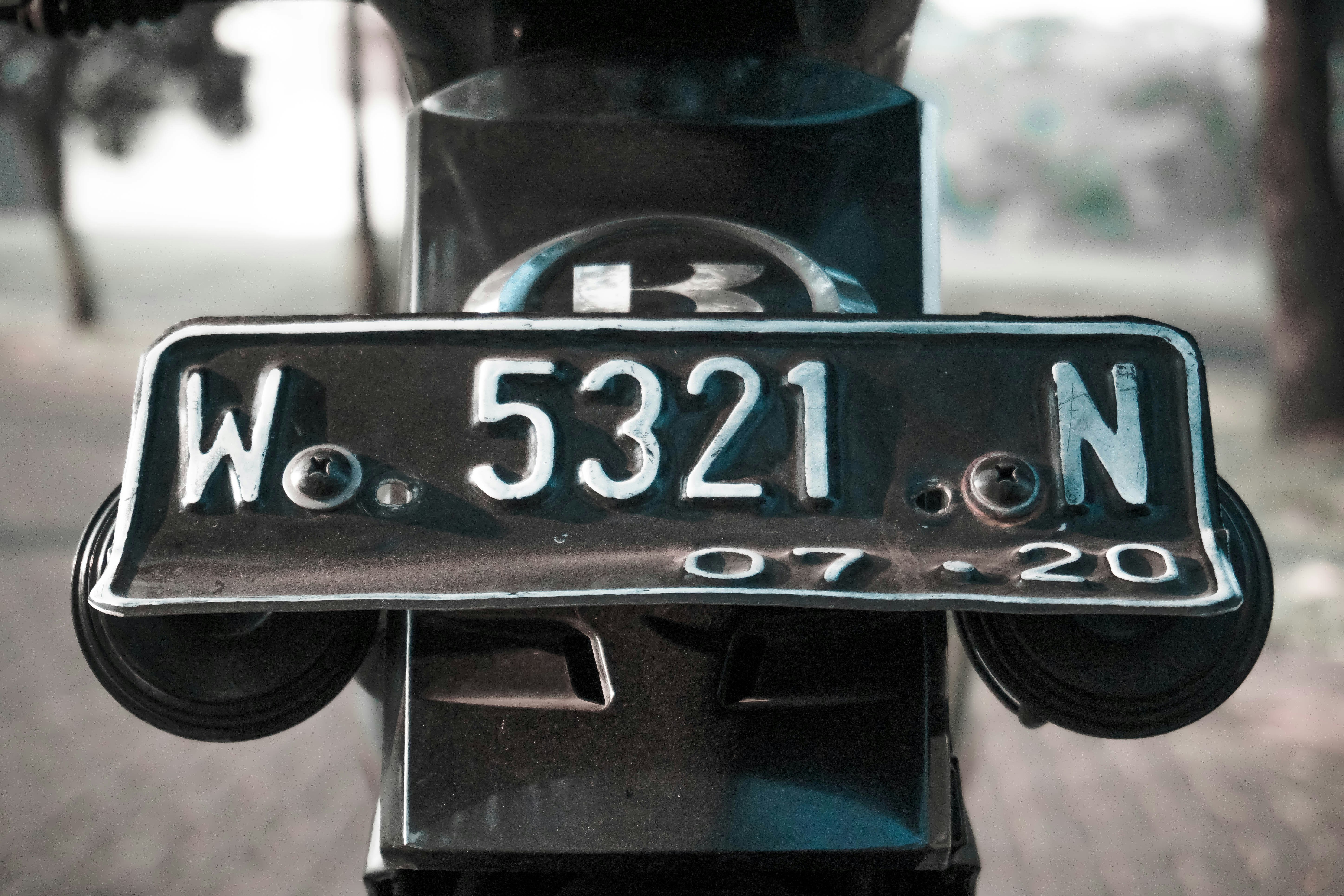 a close up of a street sign on a pole