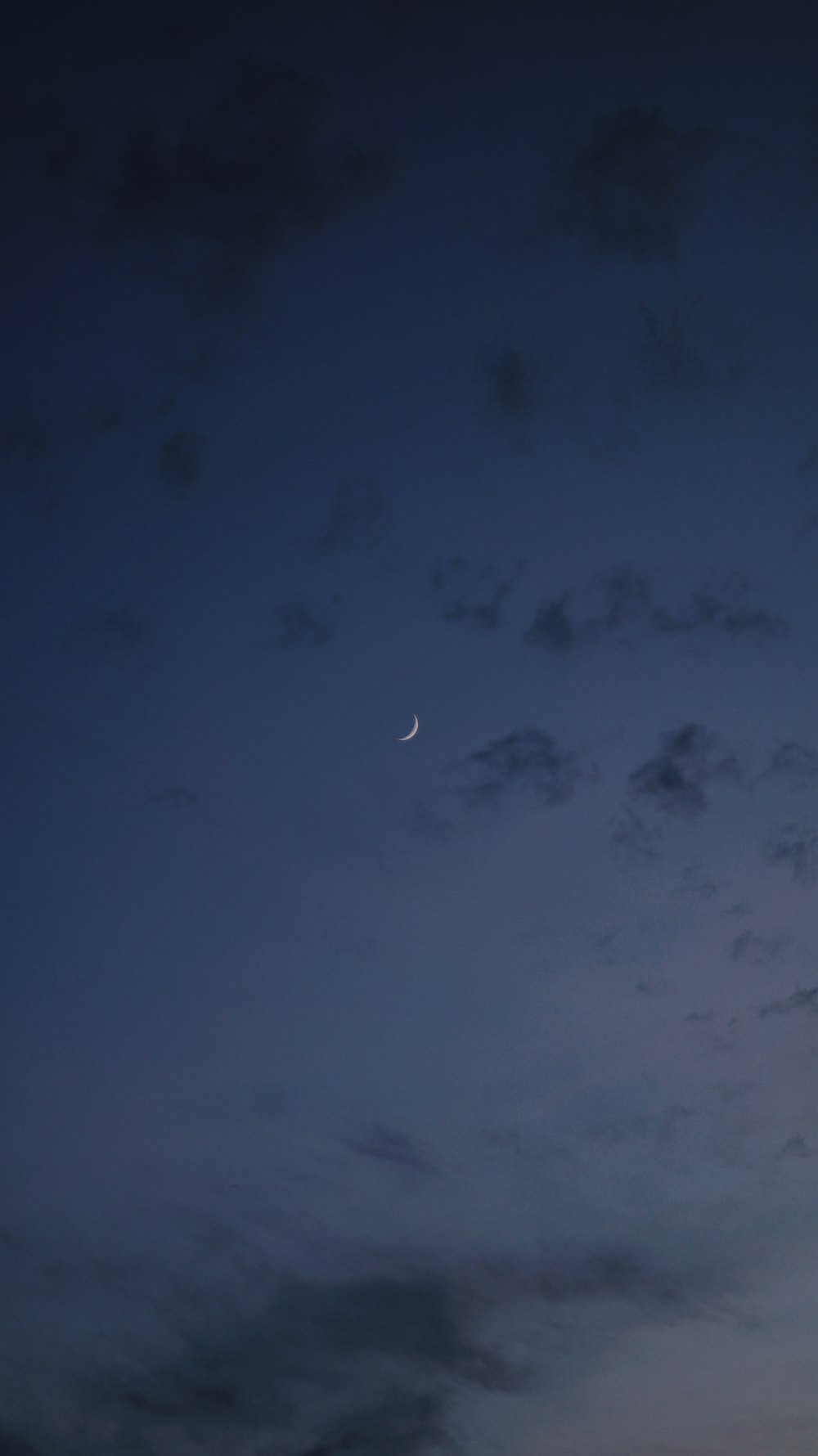 a plane flying in the sky at night