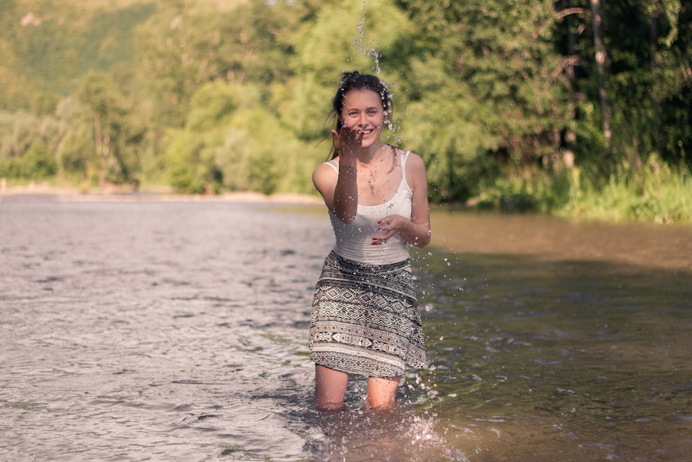 woman playing with water