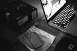 turned on laptop near items