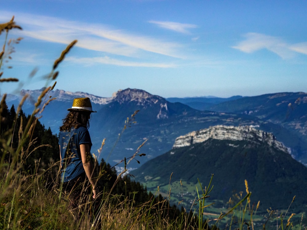 woman standing on hill