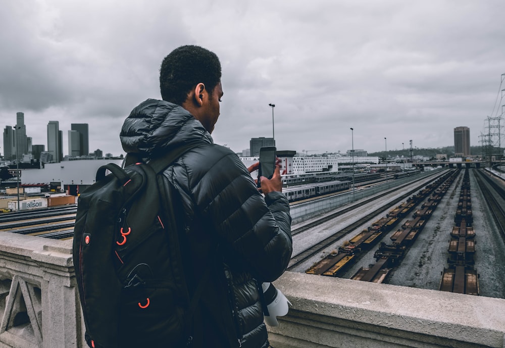 man capturing the street