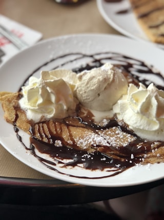 crepe with ice cream and syrup