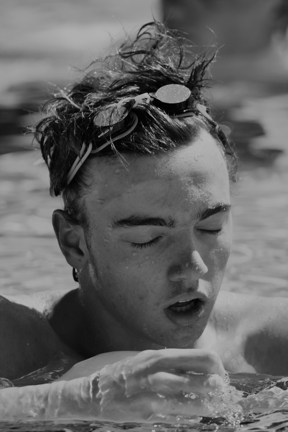 man dipping in the pool