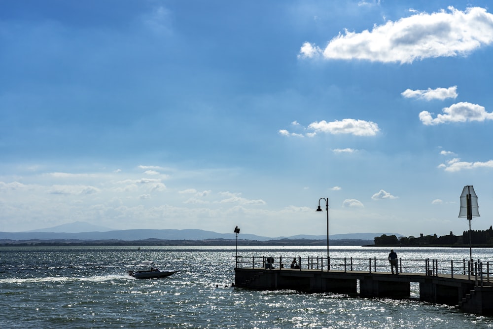 a boat traveling across a large body of water