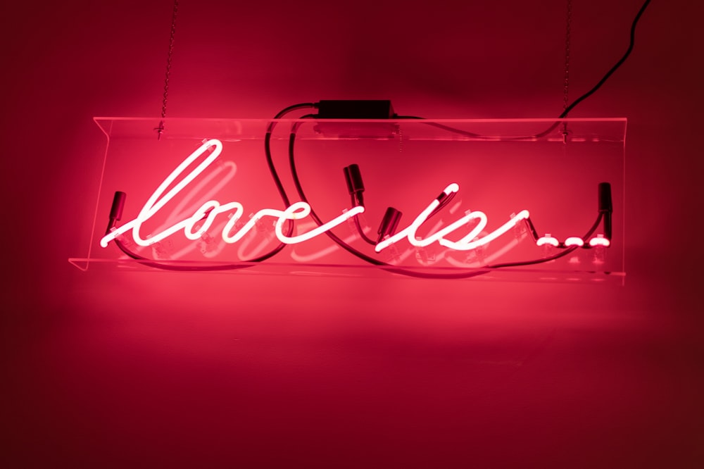 red love is neon signage