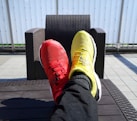 pair of red-and-yellow sneakers