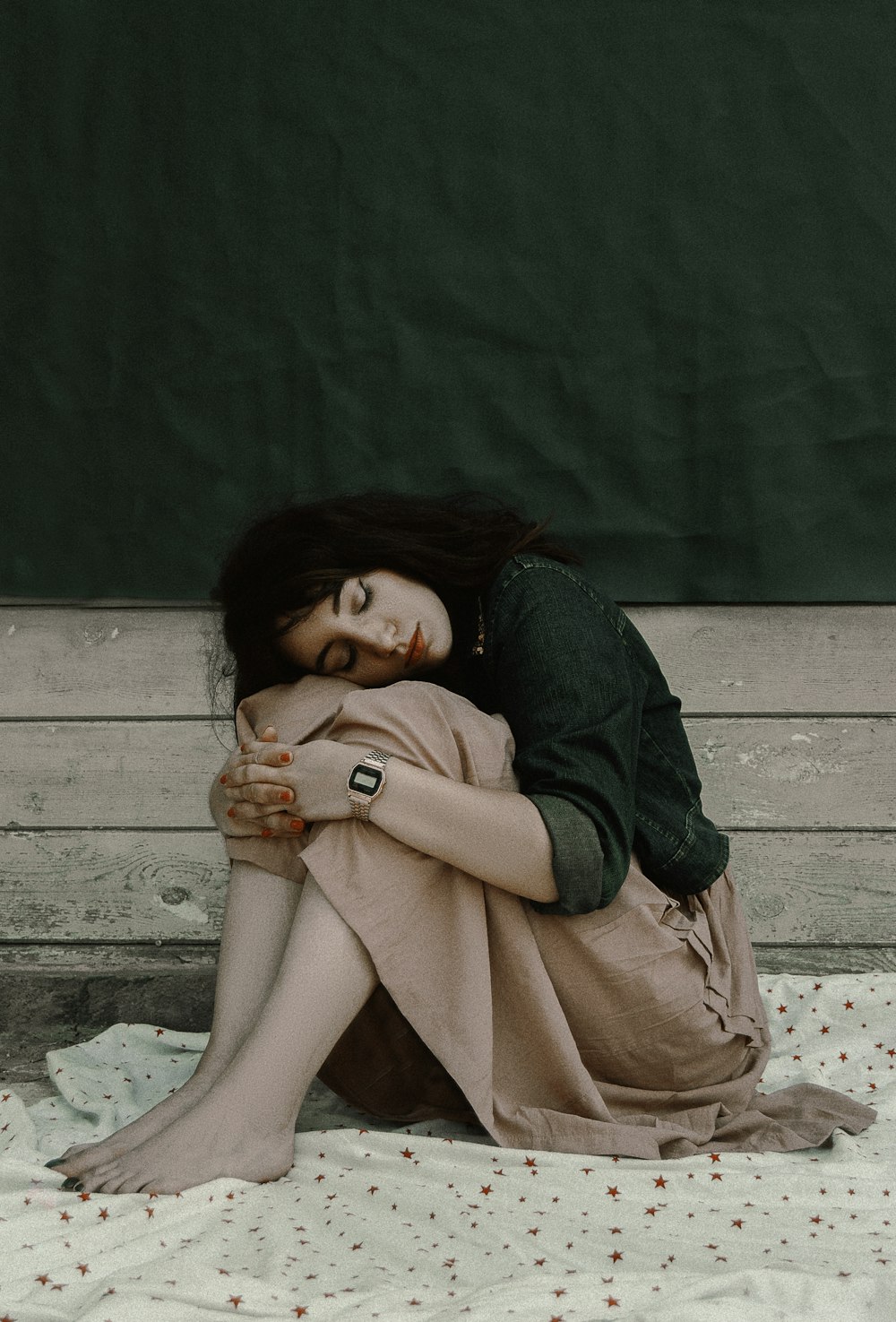 woman sitting on floor