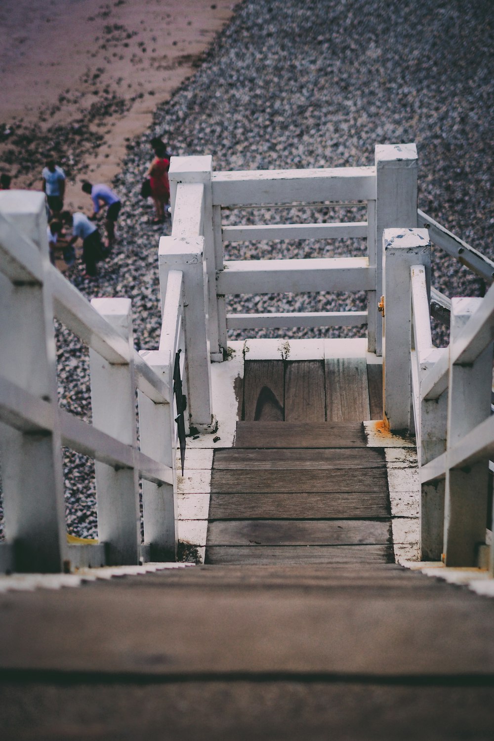 a group of people walking up a set of stairs