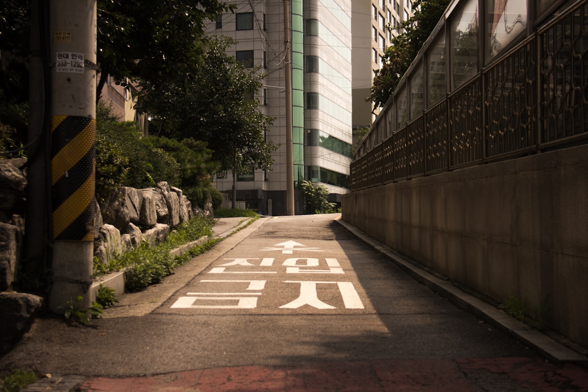 A street in Seoul lined with buildings on a clear day