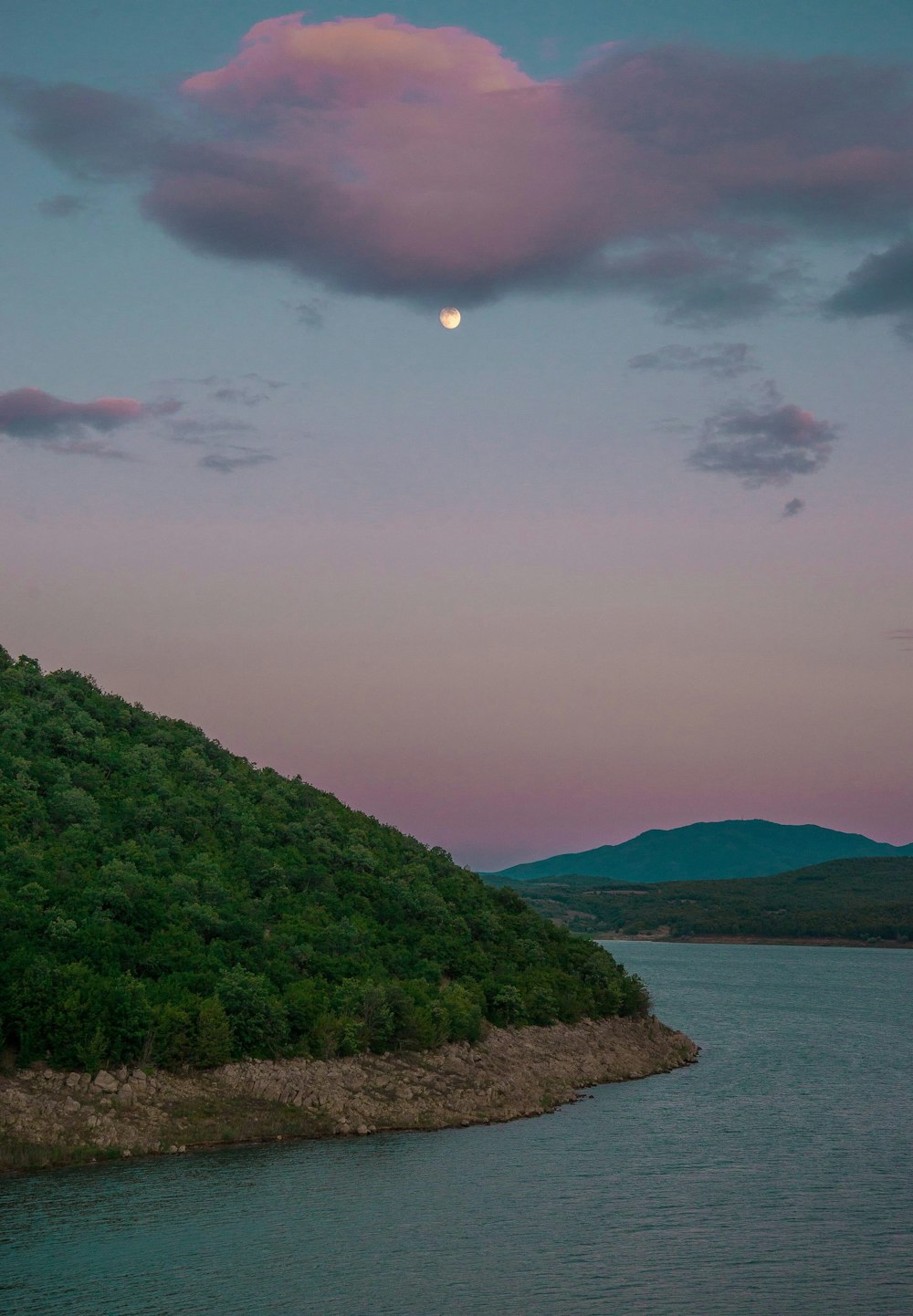 mountain near body of water