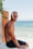 man sitting on white wooden frame