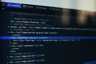 A computer screen displays a code editor with HTML code. The interface has a dark theme with syntax highlighting in various colors. Menu options like Inspector and Console are visible at the top.