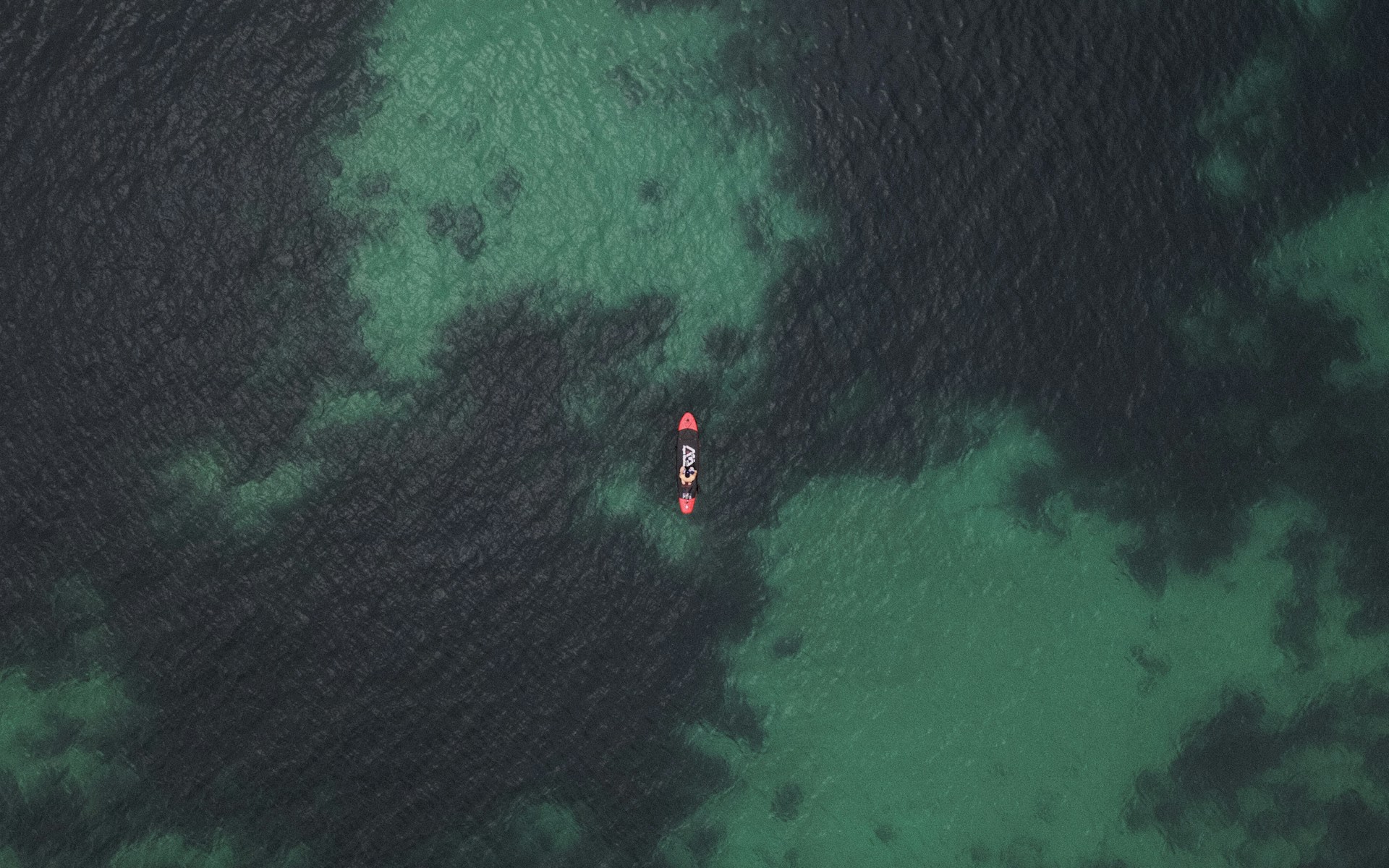 woman wearing yellow long-sleeved dress under white clouds and blue sky during daytime