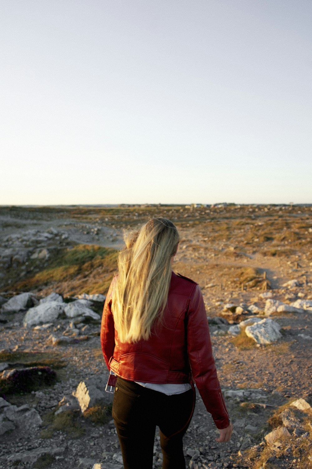 woman in red jacket