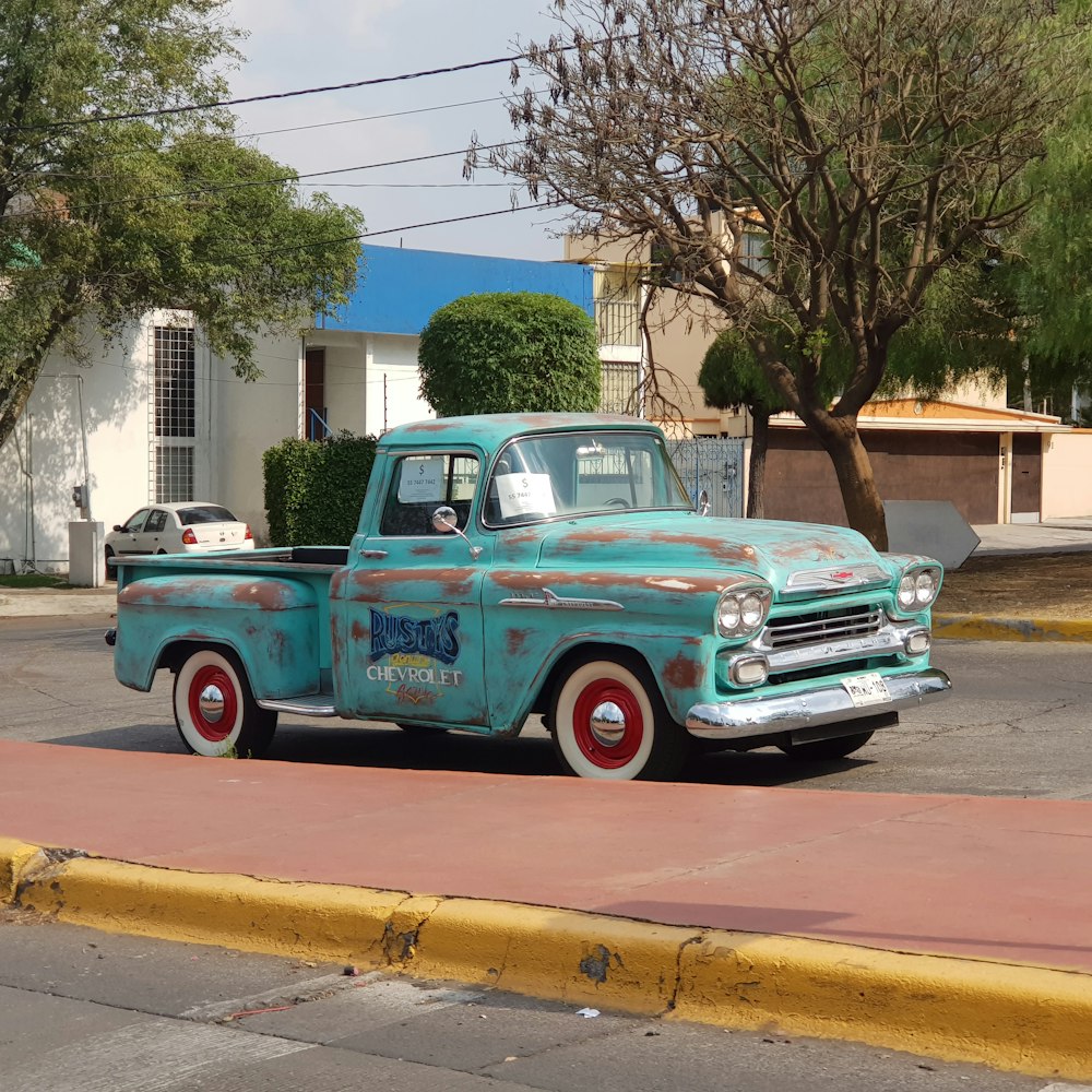 classic blue single-cab pickup truck