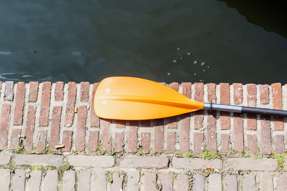 orange boat paddle