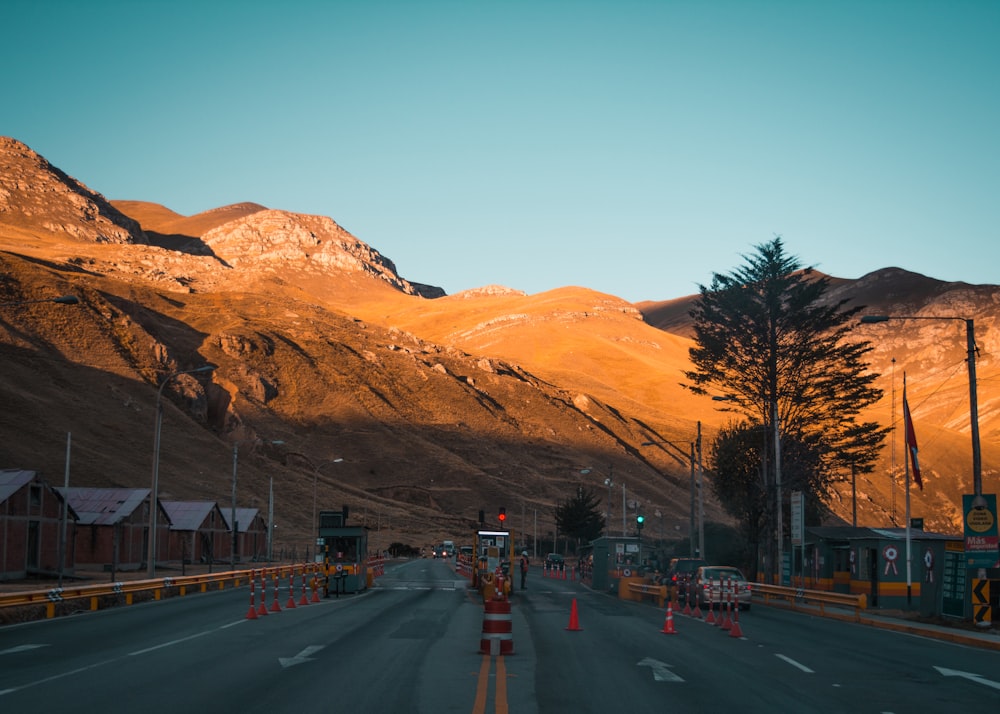 concrete road between hills