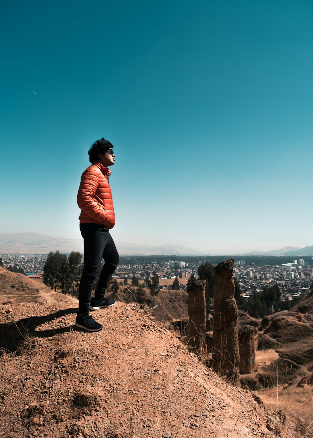 unknown person standing outdoors