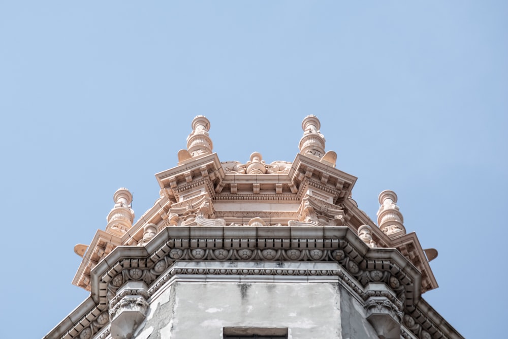 low angle photo of white and brown concrete tower