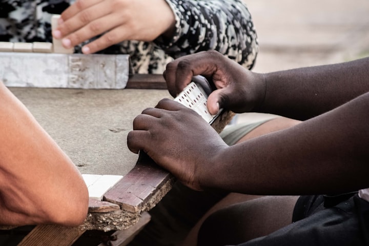 How to Play Dominoes with West Indians