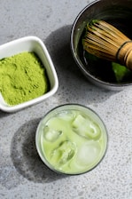 green powder in white bowl