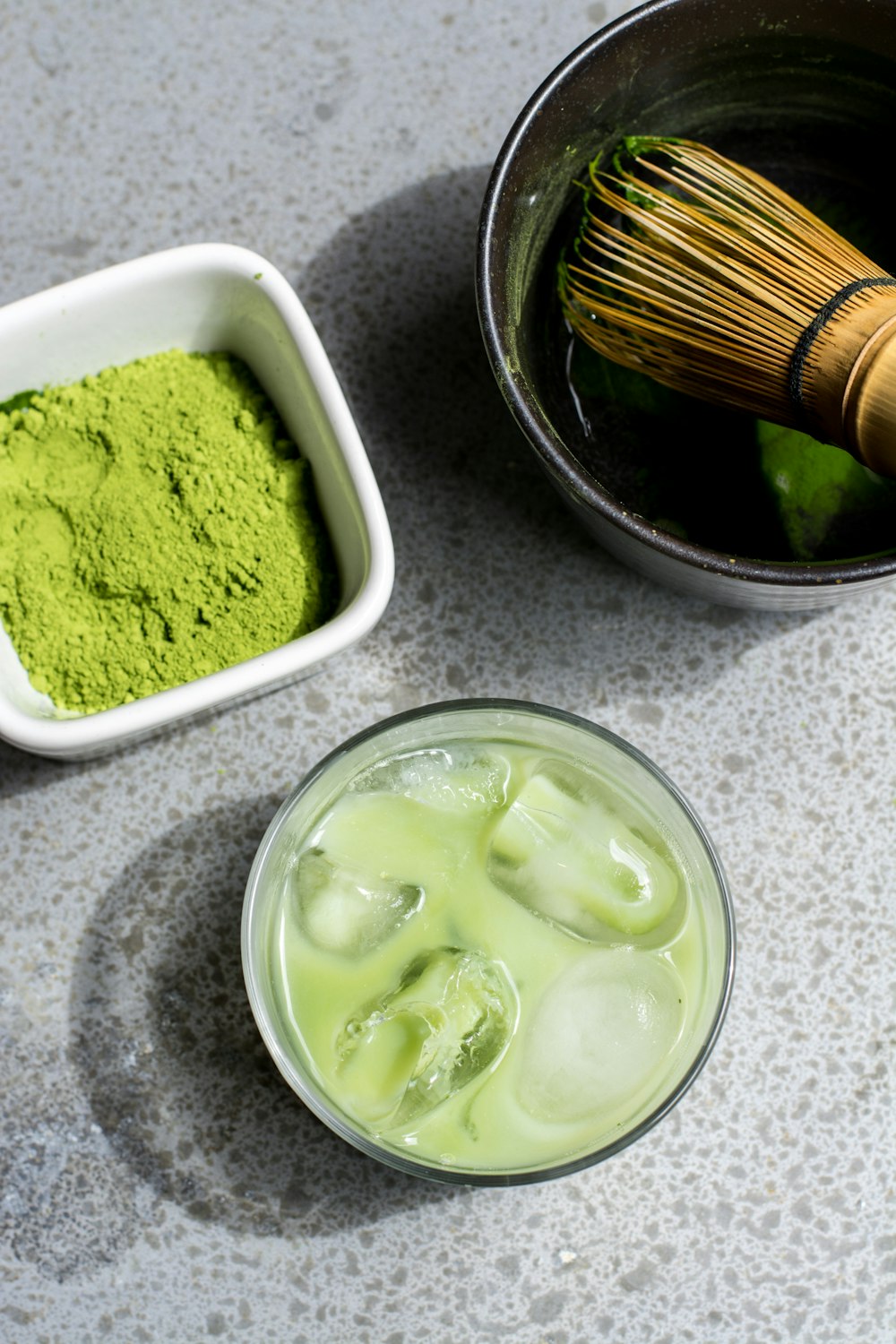 green powder in white bowl