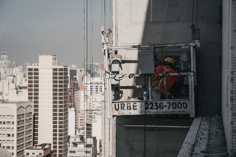 man working on building