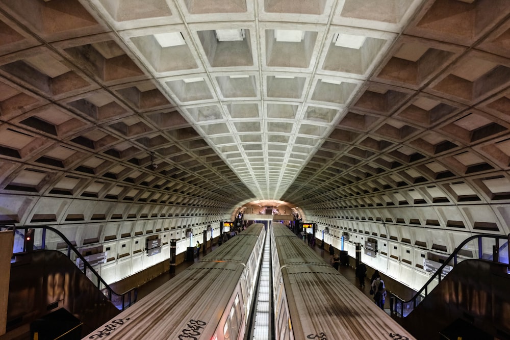 a train station filled with lots of wooden tracks