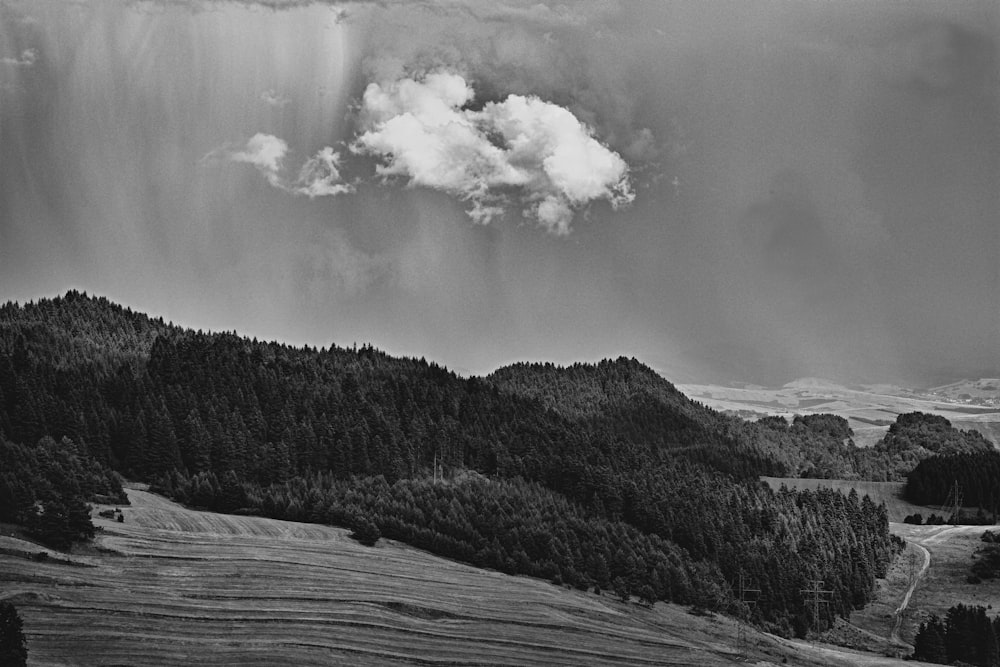 a black and white photo of a mountain range