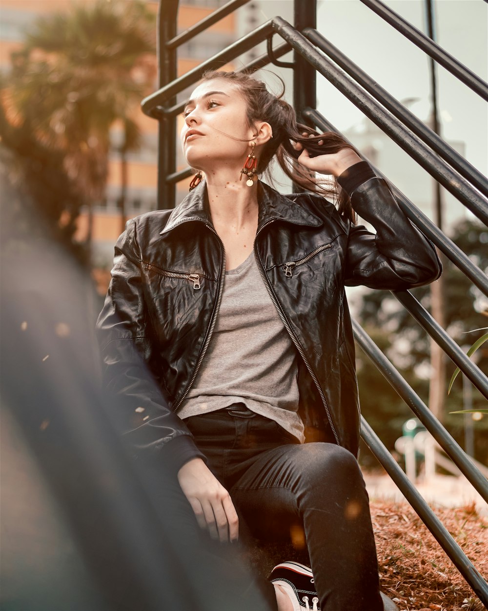 woman in a black leather jacket