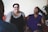 two women sitting on sofa
