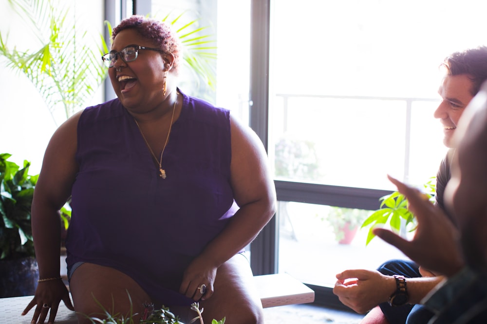 woman in purple top