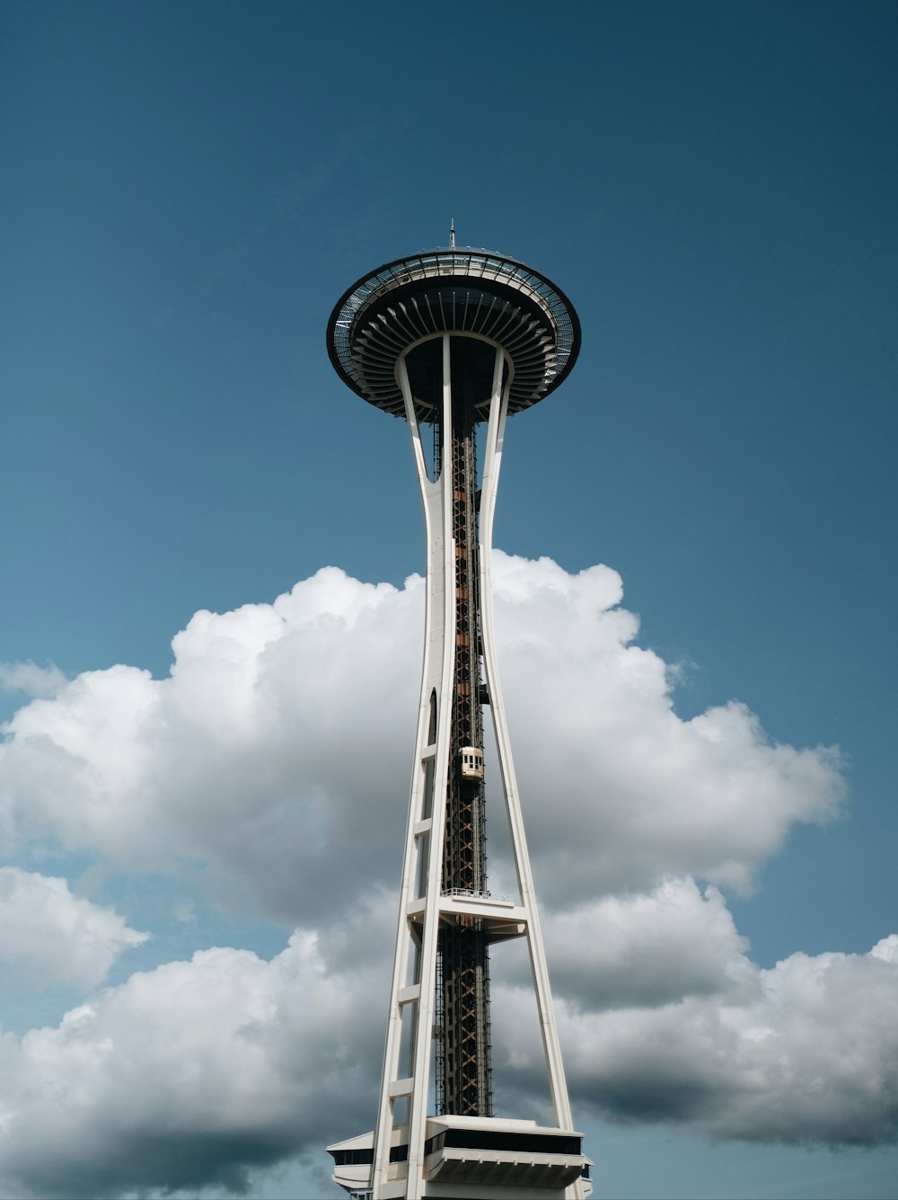 Space Needle in Seattle under blue and white skies