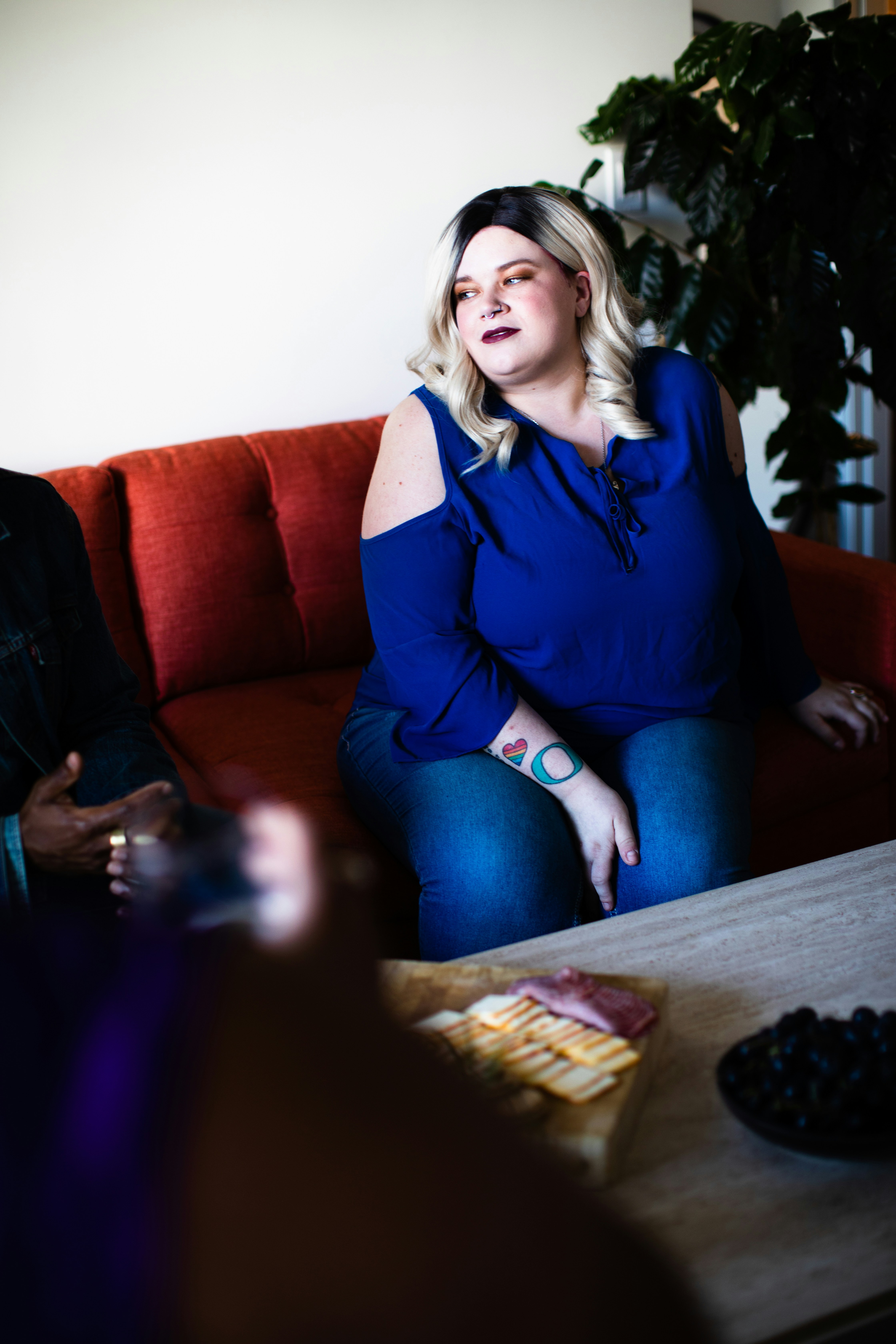 White plus size woman on couch