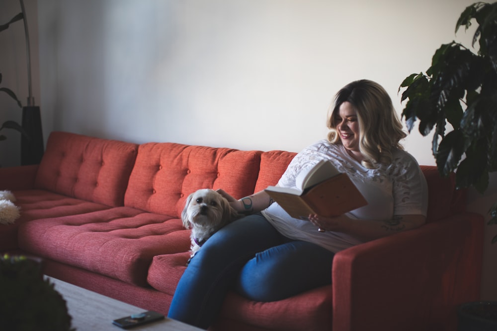 woman and dog on sofa