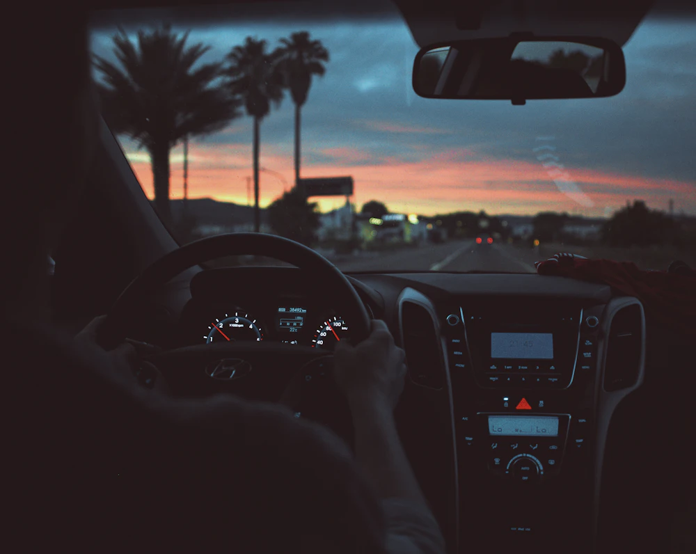View from the driver's seat at sunset