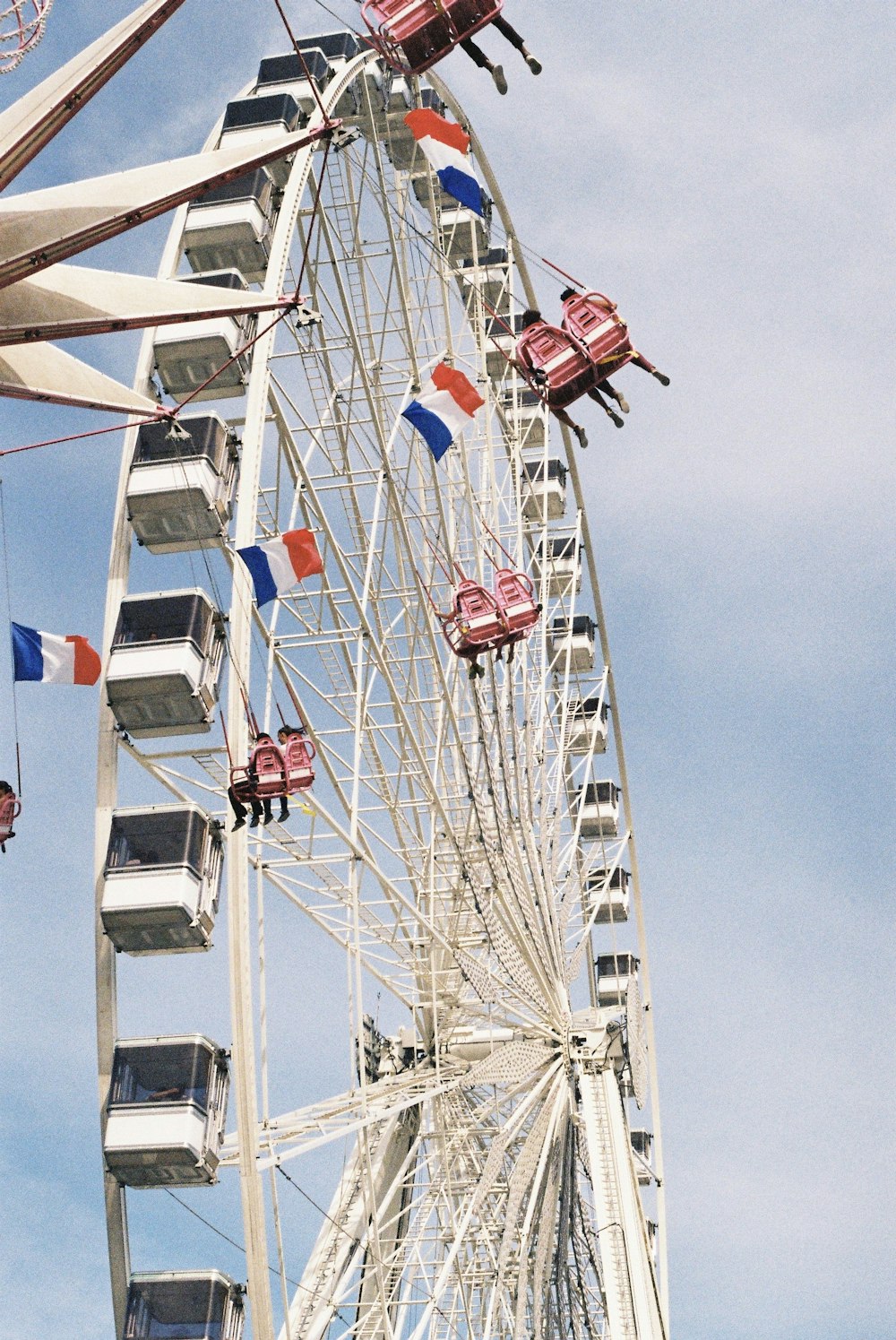 people riding on amusement ride