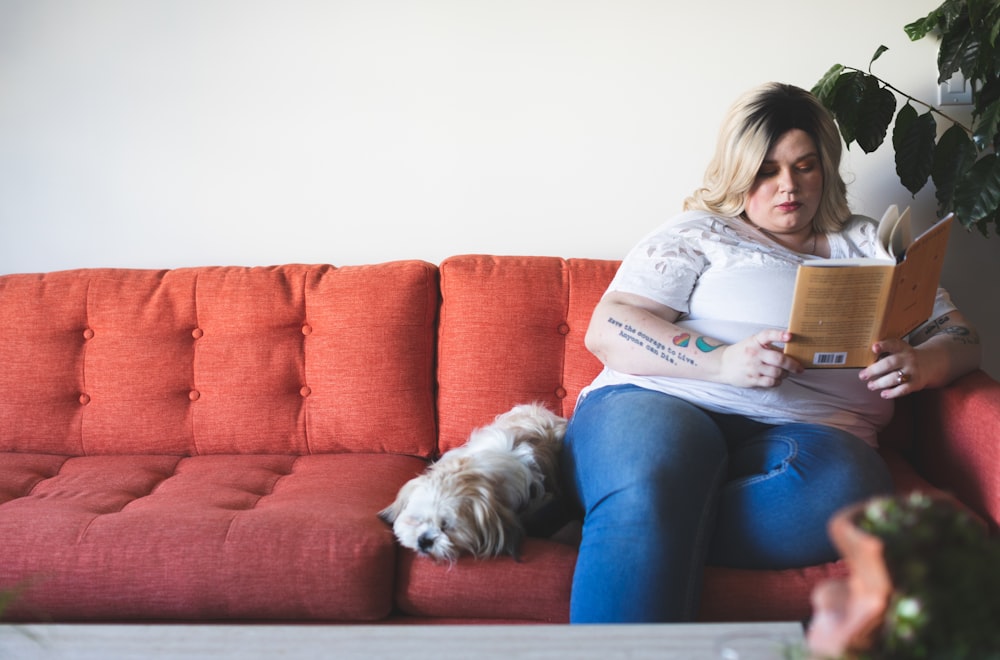 woman sitting on sofa