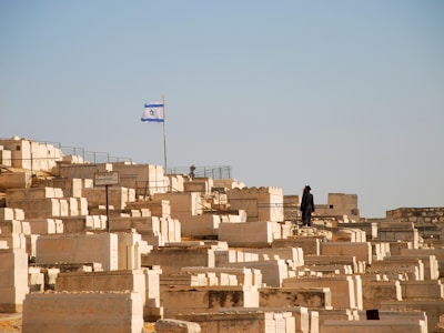 man standing on graveyard