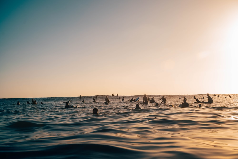 people on body of water during daytime