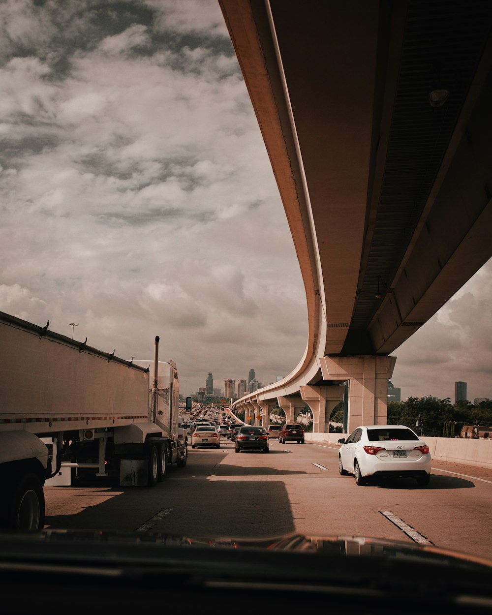 white car on road