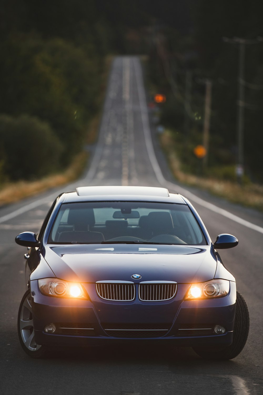 blue BMW car macro photography