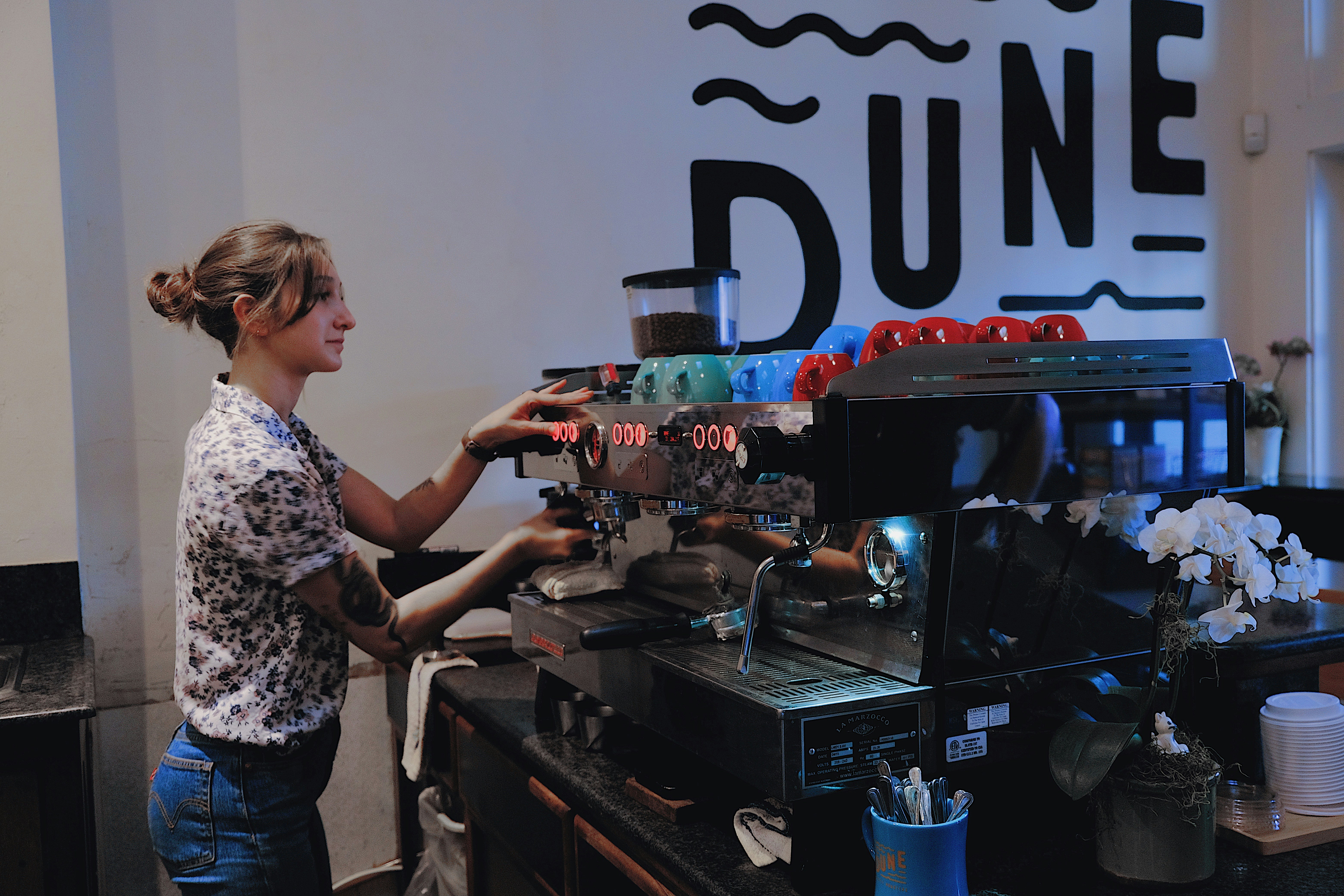 woman making coffee