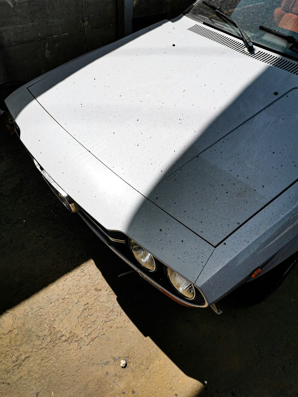 white Ford Mustang coupe