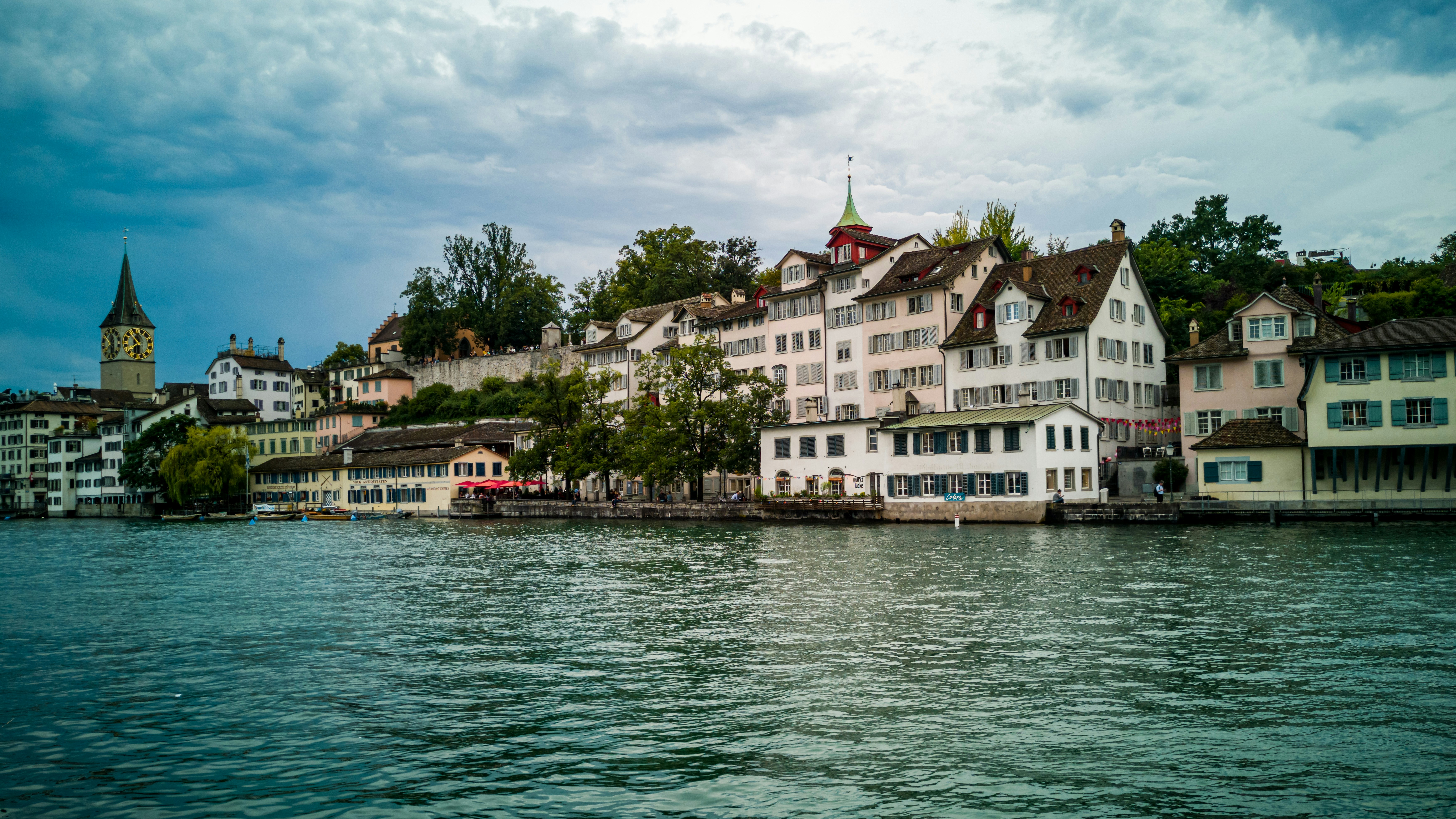 white houses near body of water, 