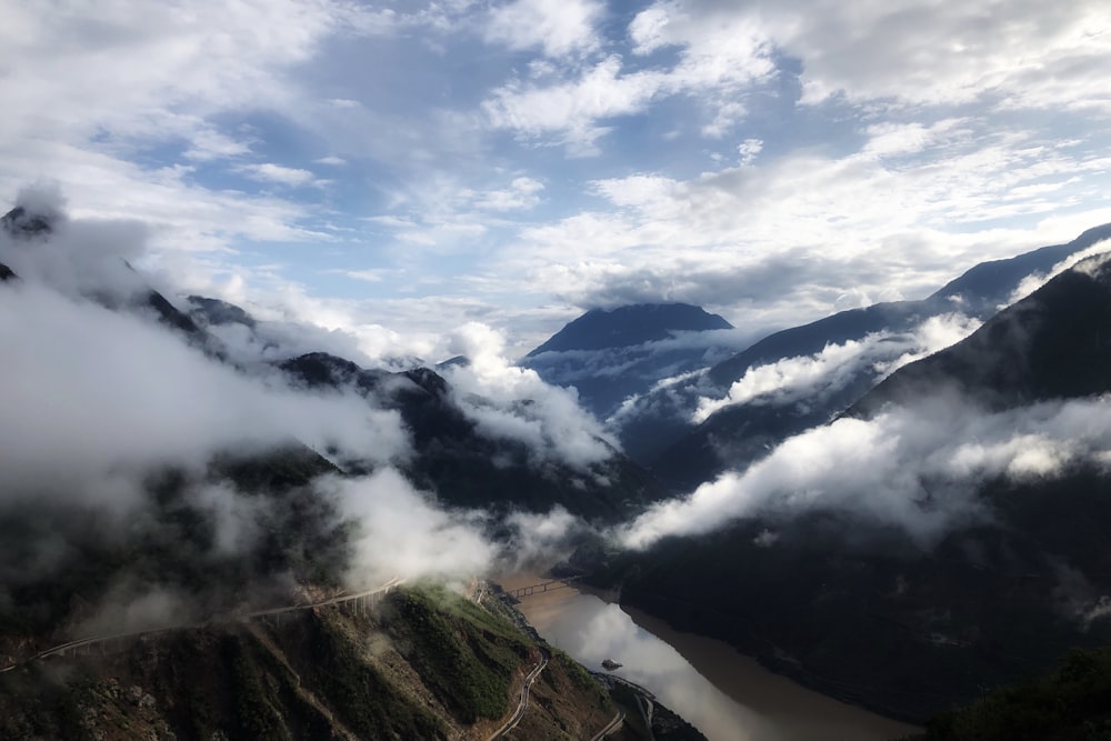 foggy mountain during daytime