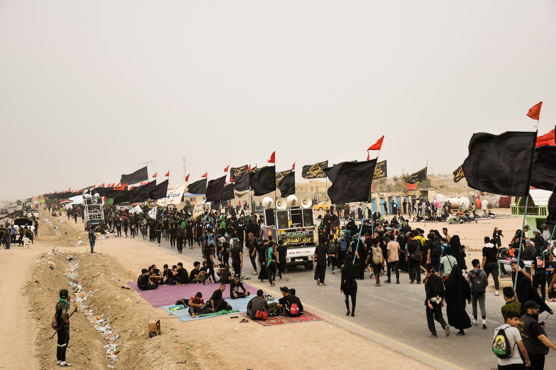 woman wearing yellow long-sleeved dress under white clouds and blue sky during daytime